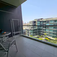 Spacious 1BR Furnished Pool-View Condo at Apus, Central Pattaya — Large Balcony & Resort Pool thumbnail