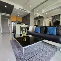 Spacious 1BR Furnished Pool-View Condo at Apus, Central Pattaya — Large Balcony & Resort Pool thumbnail