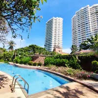 Experience elevated coastal living in this spacious 4-bedroom thumbnail