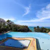 Experience elevated coastal living in this spacious 4-bedroom thumbnail