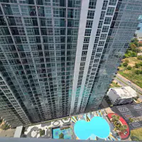 Perched on the 28th floor in the heart of Jomtien Beach, this stylish 2-bedroom, thumbnail
