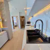 Perched on the 28th floor in the heart of Jomtien Beach, this stylish 2-bedroom, thumbnail