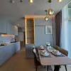 Perched on the 28th floor in the heart of Jomtien Beach, this stylish 2-bedroom, thumbnail