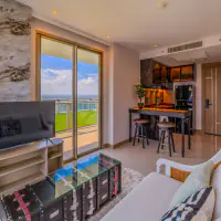 Experience modern luxury in this beautifully designed high-floor residence at Riviera Ocean Drive thumbnail
