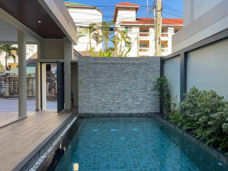 A newly built two-storey house with a private swimming pool for sale