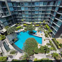 Spacious 1BR Furnished Pool-View Condo at Apus, Central Pattaya — Large Balcony & Resort Pool thumbnail