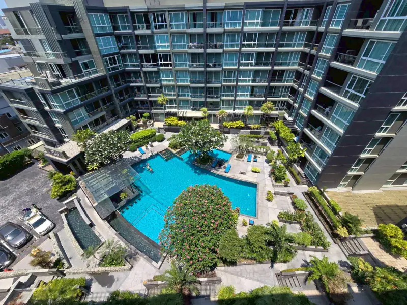 Spacious 1BR Furnished Pool-View Condo at Apus, Central Pattaya — Large Balcony & Resort Pool